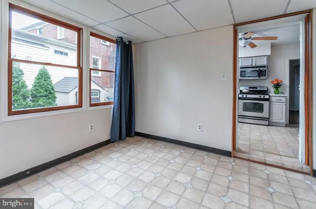 a view of a kitchen with a window