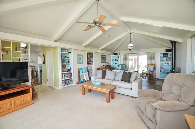 a kitchen with a stove a sink and a refrigerator