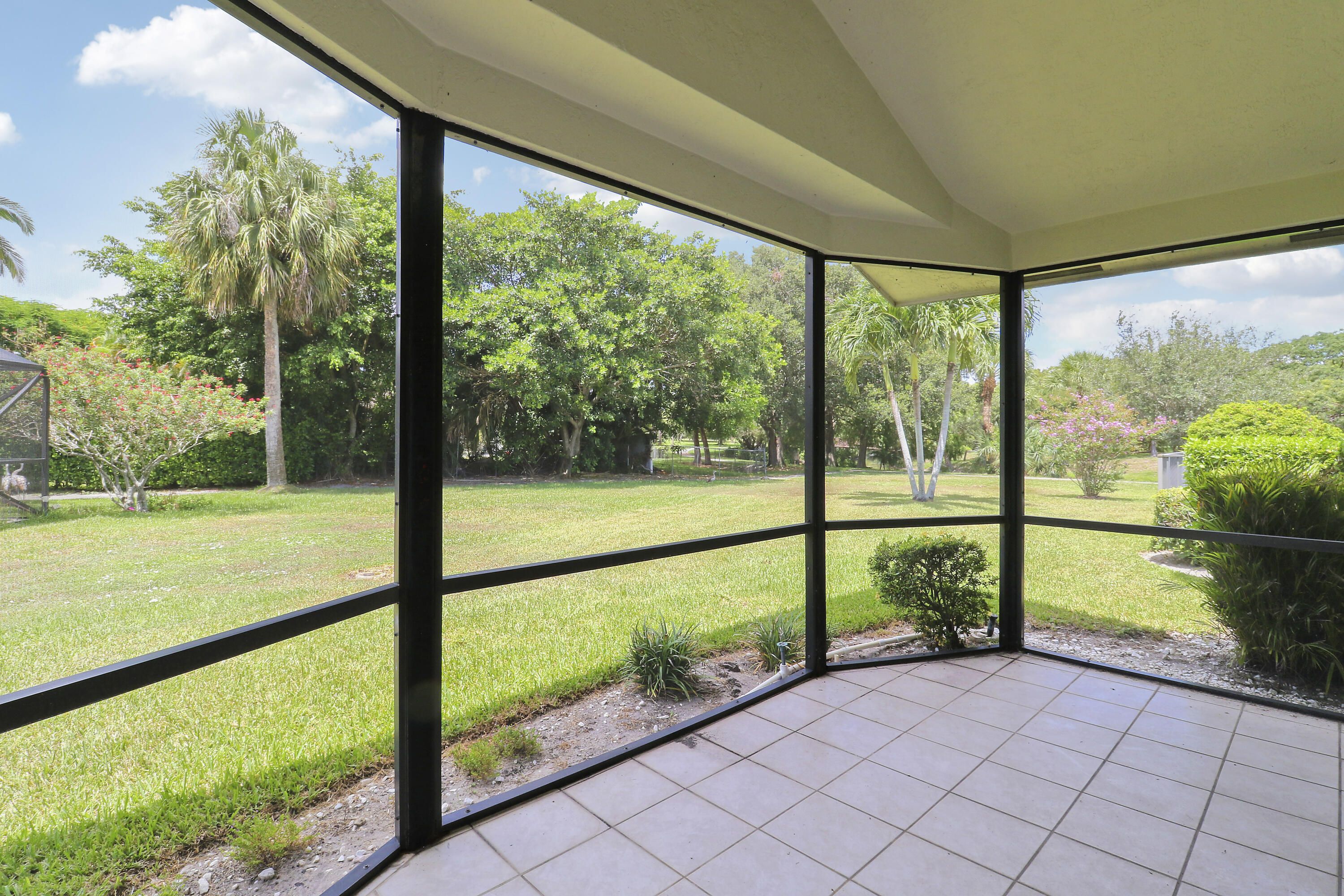 21777 Beachnut Drive Boca Raton, FL 33433 - Photo 15 of 64 Screen Patio Off of Formal Dining