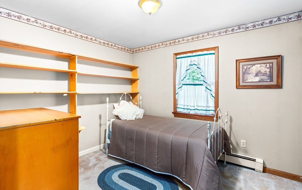 465 Doe Valley Road Athol, MA 01331 - Photo 14 of 36 a bedroom with a bed and a window