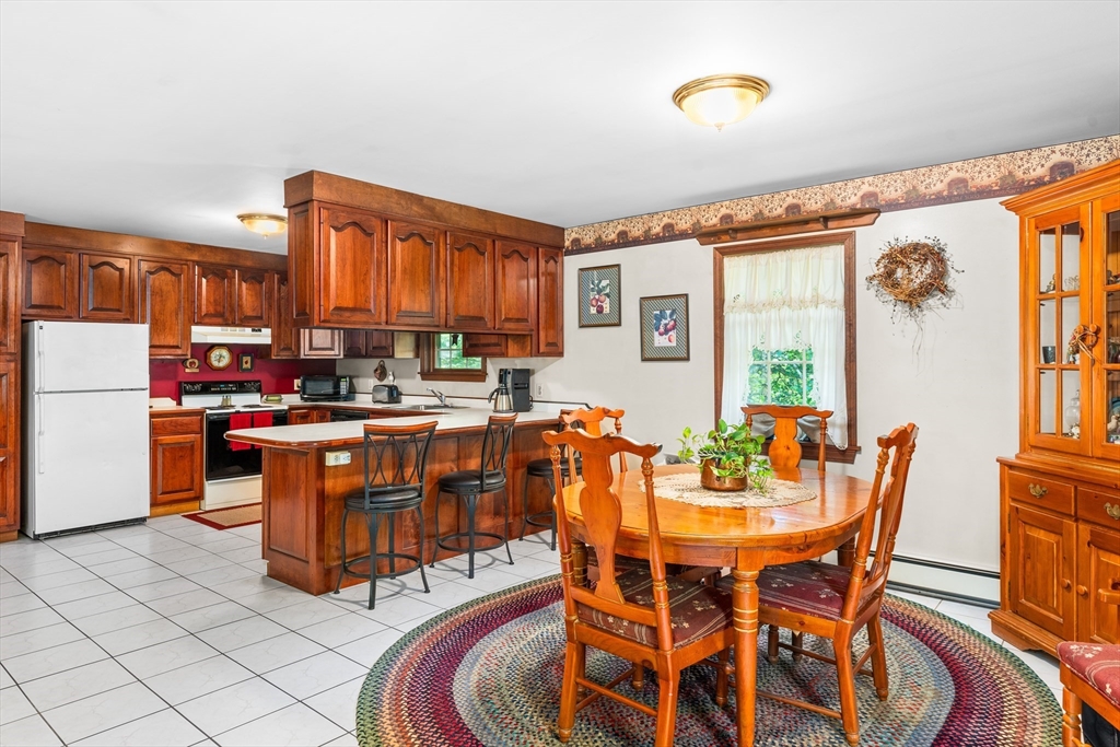 465 Doe Valley Road Athol, MA 01331 - Photo 2 of 36 a view of a dining room with furniture window and outside view