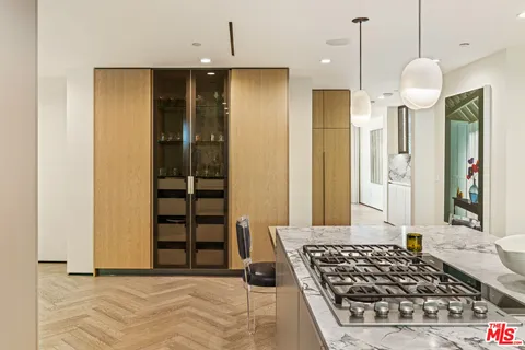 a view of a spacious bathroom with a bathtub