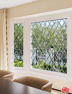 a view of a bench in front of a door