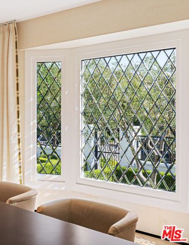 a view of a bench in front of a door