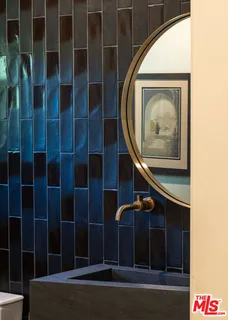 a view of staircase with wooden floor and a potted plant