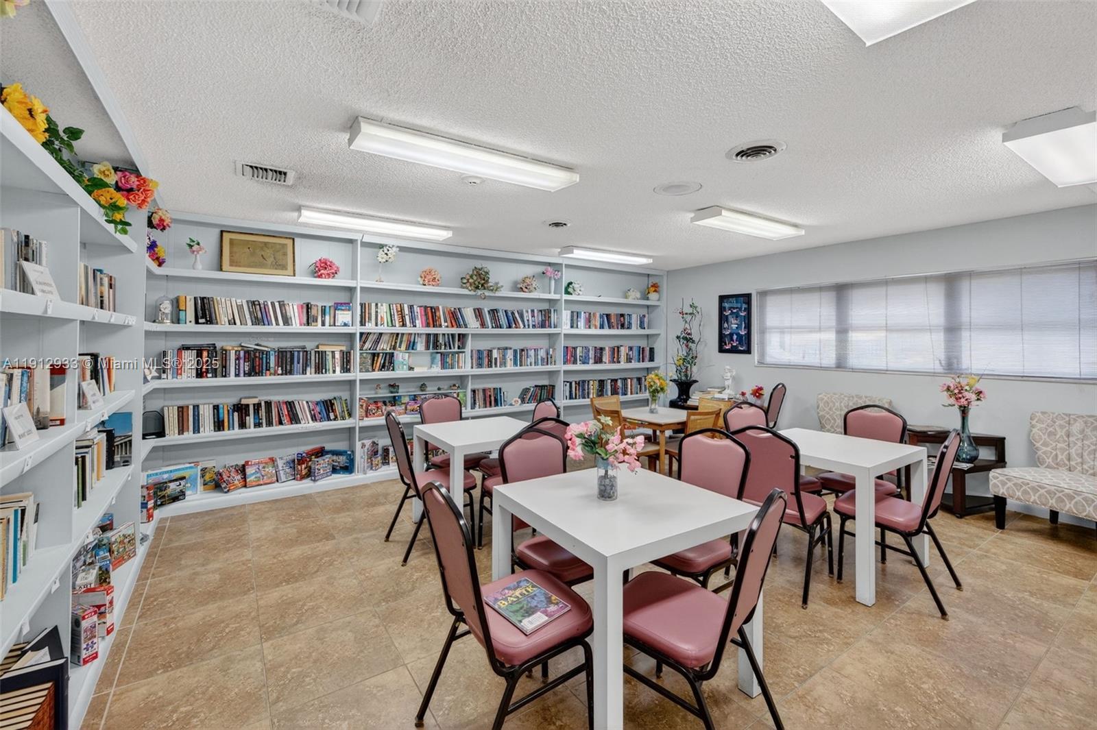 7817 Golf Cir Drive, Unit 305 Margate, FL 33063 - Photo 39 of 43 a view of a dining room with furniture