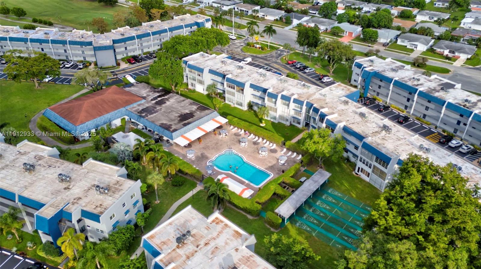 7817 Golf Cir Drive, Unit 305 Margate, FL 33063 - Photo 41 of 43 a city view with tall buildings