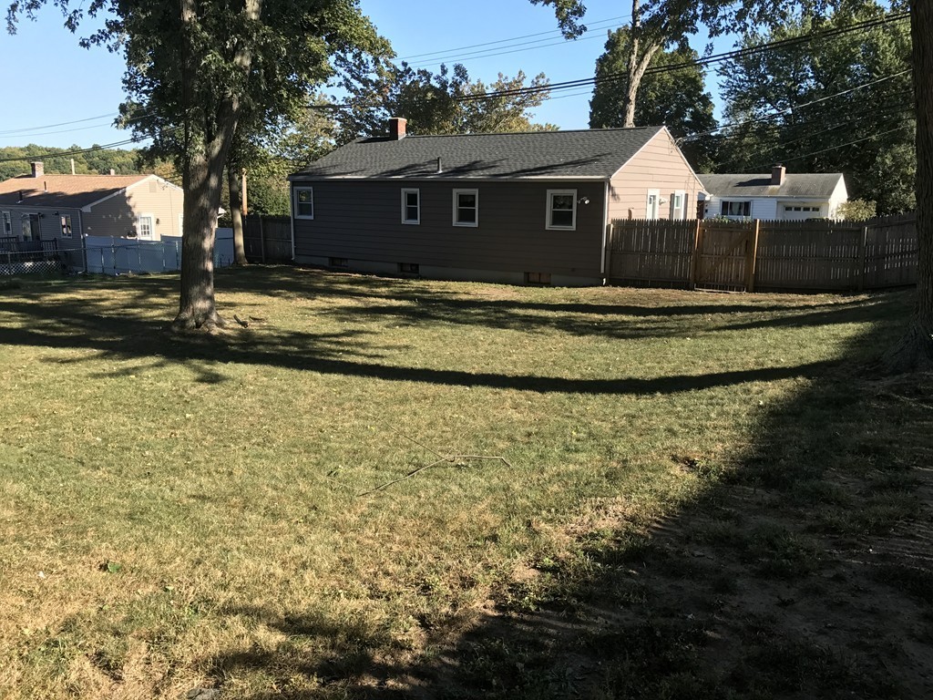 337 Westfield Road Holyoke, MA 01040 - Photo 11 of 13 a view of house with yard and garage