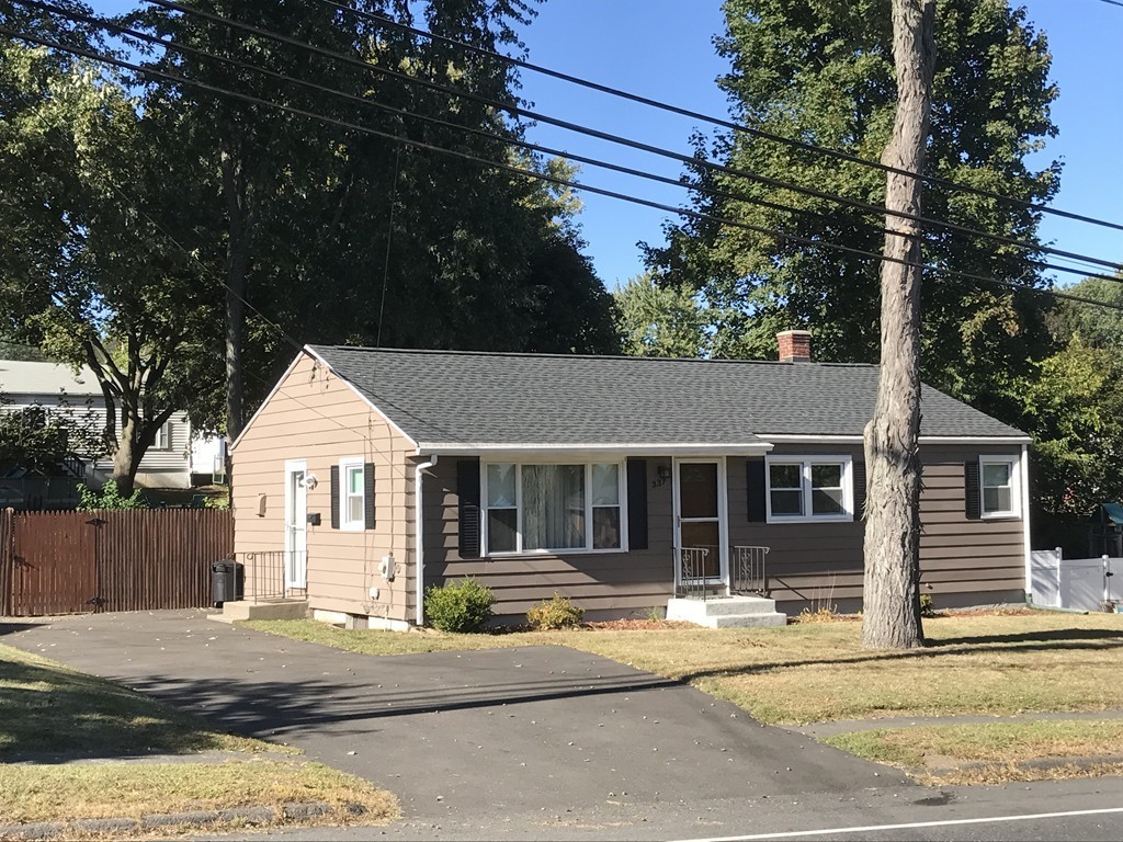 337 Westfield Road Holyoke, MA 01040 - Photo 2 of 13 front view of a house with a patio