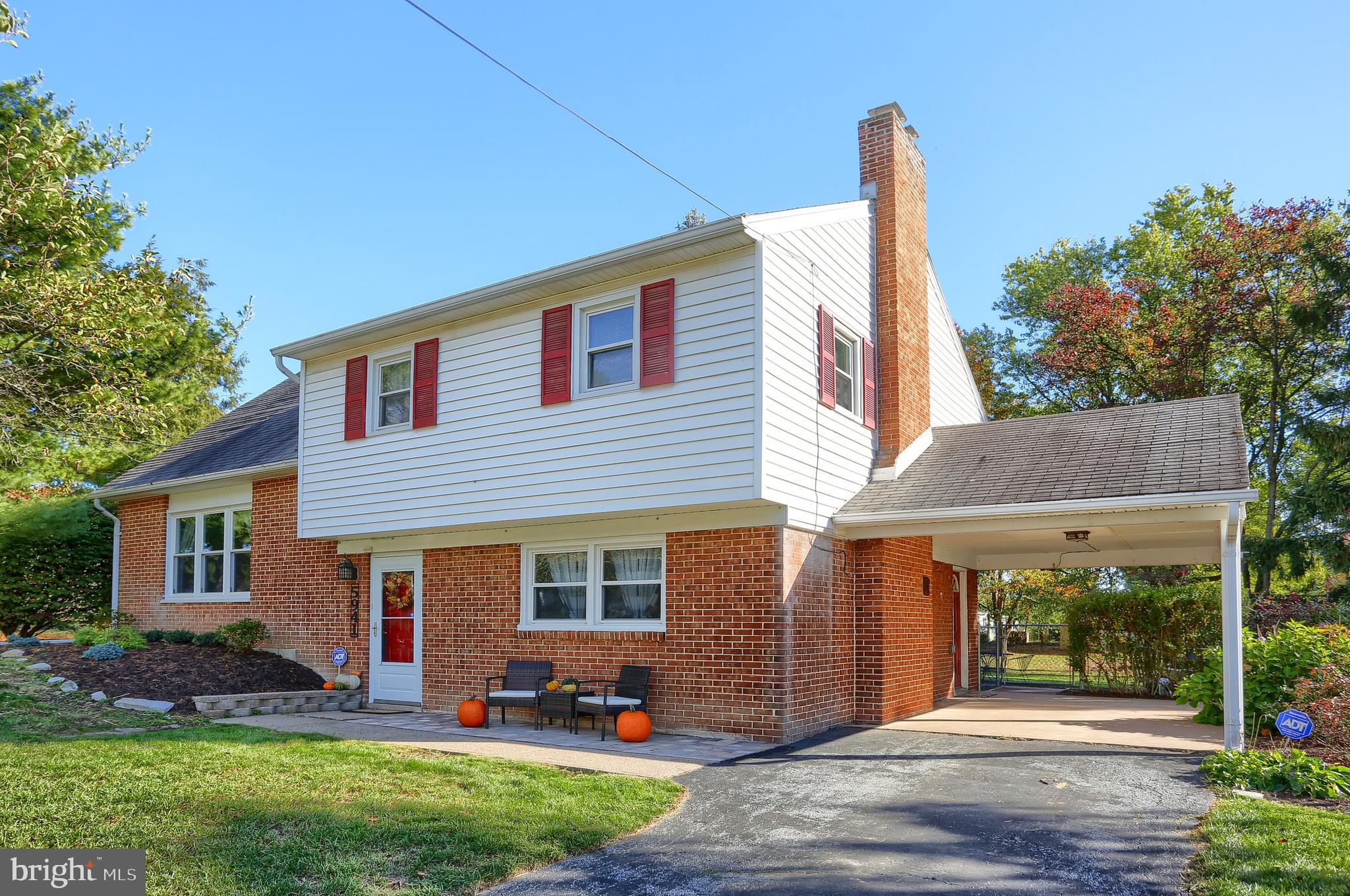 5941 Timothy Road Harrisburg, PA 17112 - Photo 2 of 35 Front Elevation with carport and driveway.