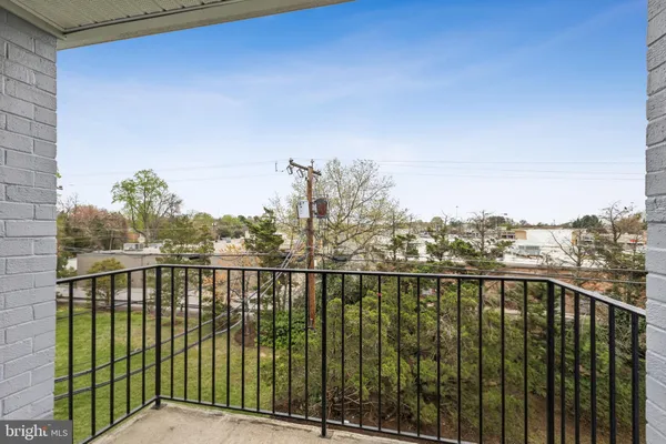 a view of a balcony with an outdoor space