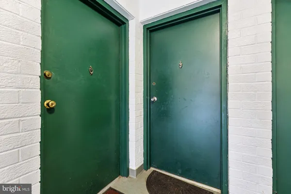 a bathroom with a shower and a sink
