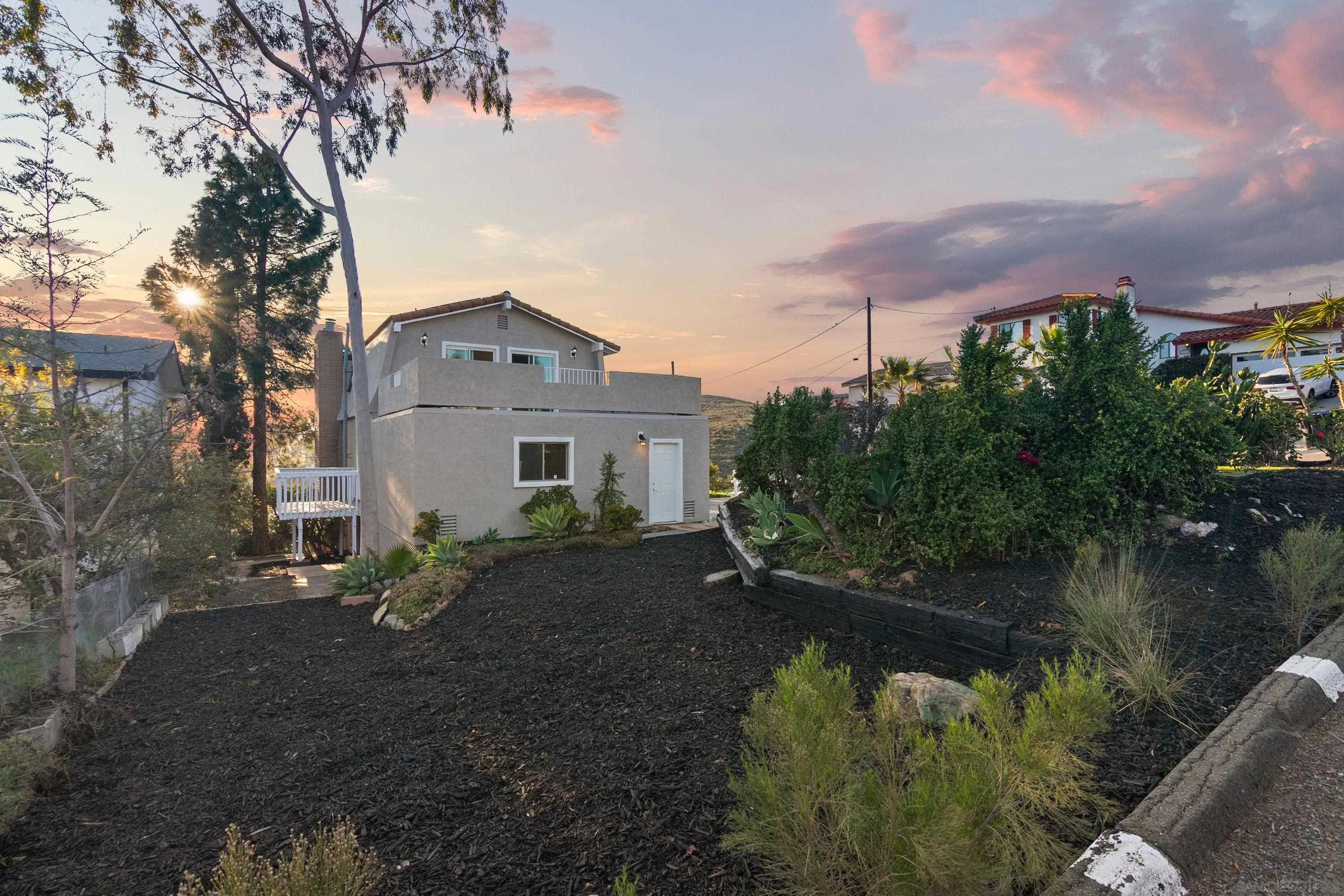 9811 Eucalyptus Street Spring Valley, CA 91977 - Photo 51 of 55 a big house with a big yard and large trees