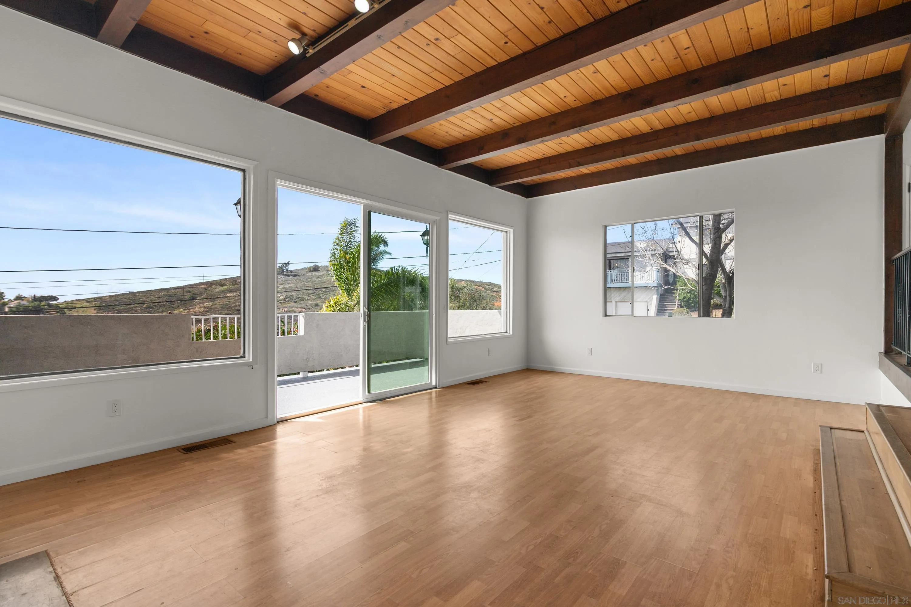 9811 Eucalyptus Street Spring Valley, CA 91977 - Photo 8 of 55 a view of an empty room with a window