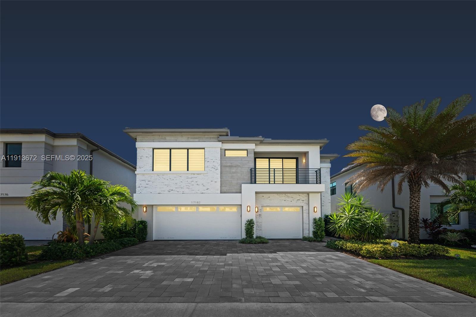 17182 Windy Pointe Lane Boca Raton, FL 33496 - Photo 12 of 13 a front view of house with yard and green space