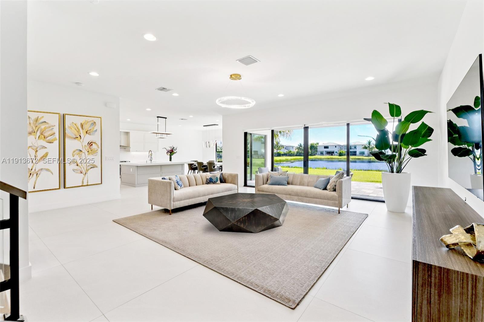 17182 Windy Pointe Lane Boca Raton, FL 33496 - Photo 3 of 13 a living room with furniture and a large window