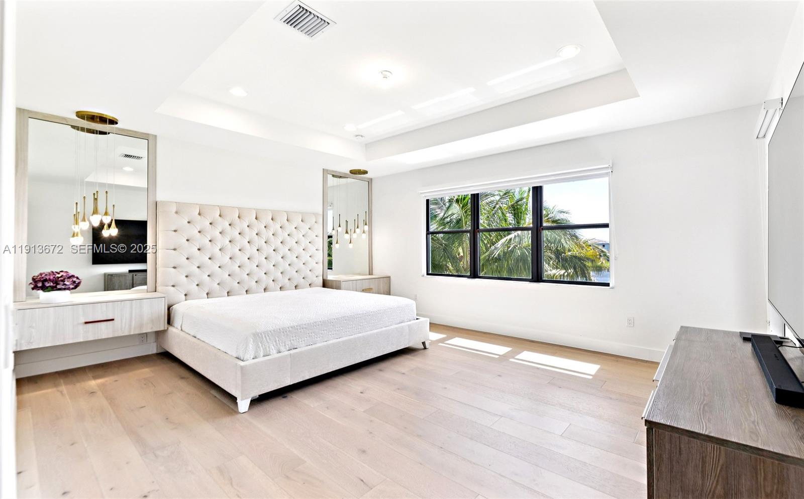 17182 Windy Pointe Lane Boca Raton, FL 33496 - Photo 10 of 13 a spacious bedroom with a large bed and a large window