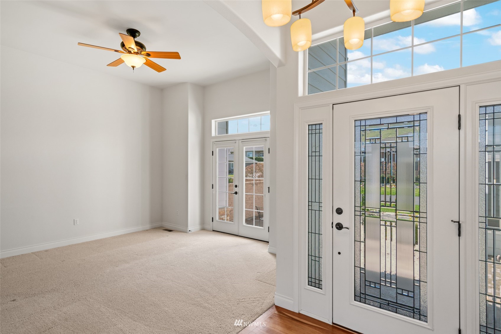 1845 Maple Street, Unit 9 Wenatchee, WA 98801 - Photo 4 of 20 a view of an entryway with wooden floor