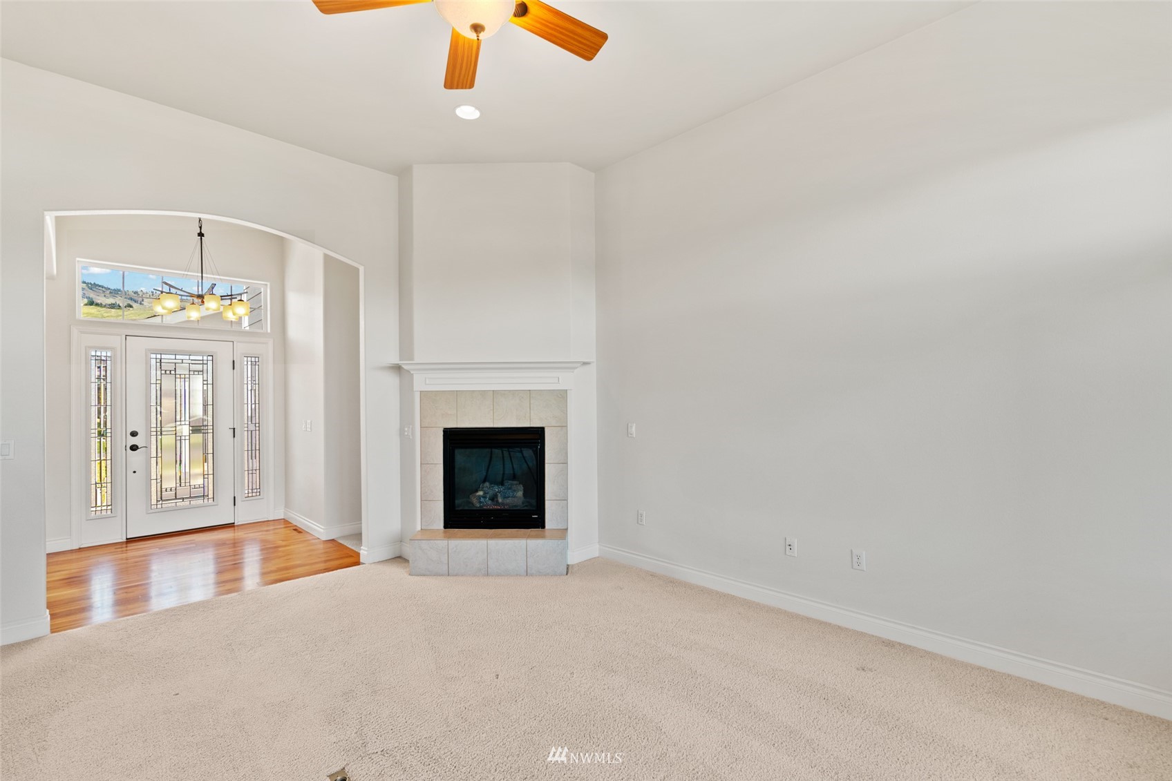 1845 Maple Street, Unit 9 Wenatchee, WA 98801 - Photo 10 of 20 a living room with furniture and a fireplace
