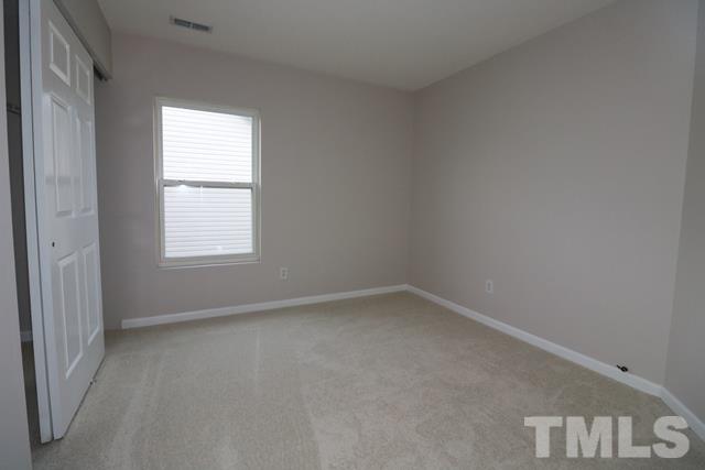 2620 Quarry Ridge Lane Raleigh, NC 27610 - Photo 14 of 25 an empty room with a window