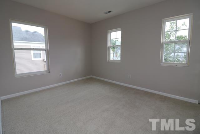2620 Quarry Ridge Lane Raleigh, NC 27610 - Photo 15 of 25 an empty room with windows
