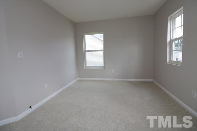 2620 Quarry Ridge Lane Raleigh, NC 27610 - Photo 16 of 25 an empty room with a window