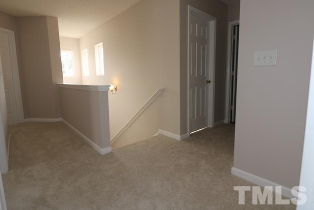 2620 Quarry Ridge Lane Raleigh, NC 27610 - Photo 19 of 25 an empty room with windows