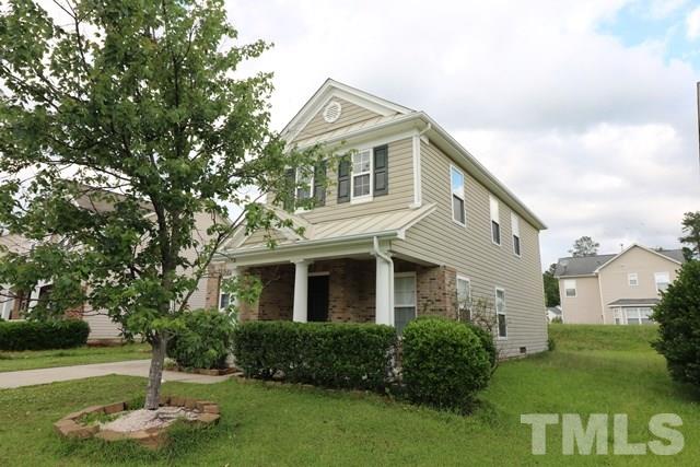 2620 Quarry Ridge Lane Raleigh, NC 27610 - Photo 25 of 25 a front view of a house with a yard