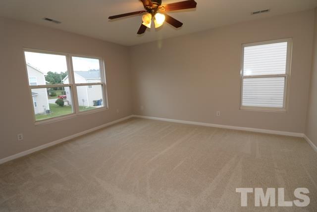 2620 Quarry Ridge Lane Raleigh, NC 27610 - Photo 9 of 25 an empty room with a window