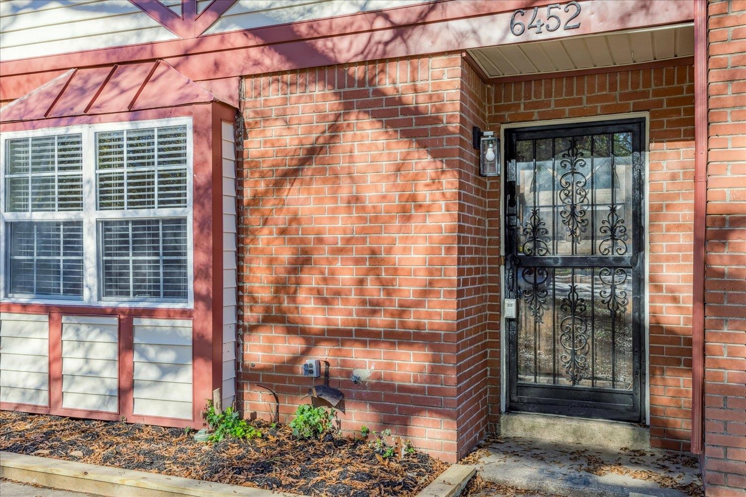 6452 Macon Road Memphis, TN 38134 - Photo 2 of 22 Property entrance featuring brick siding