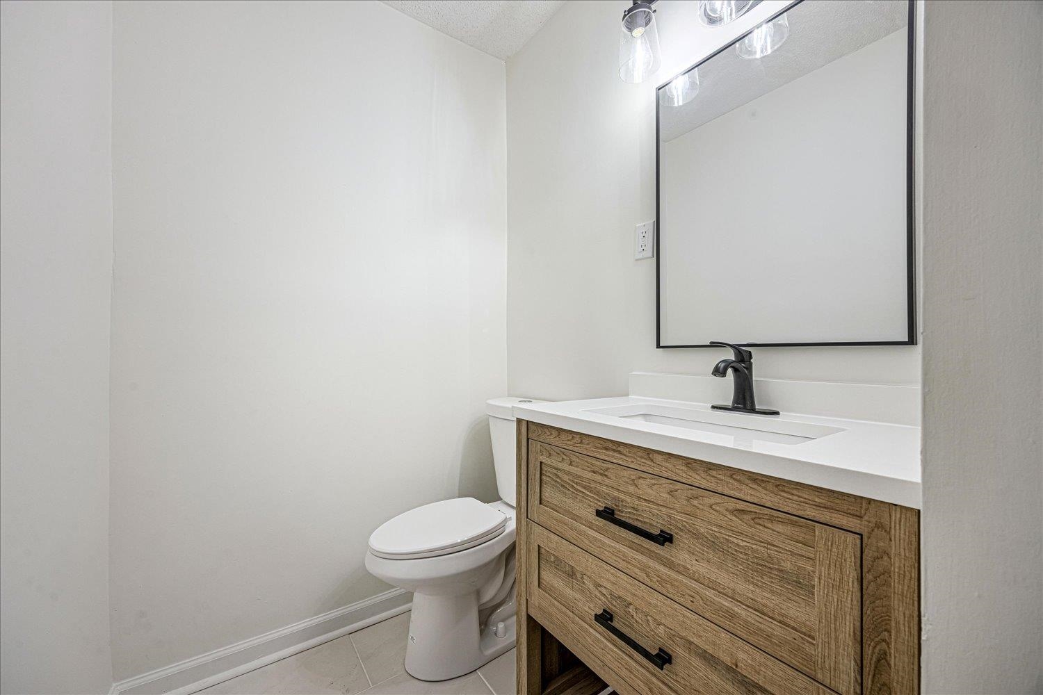 6452 Macon Road Memphis, TN 38134 - Photo 7 of 22 Bathroom featuring vanity and light tile patterned floors