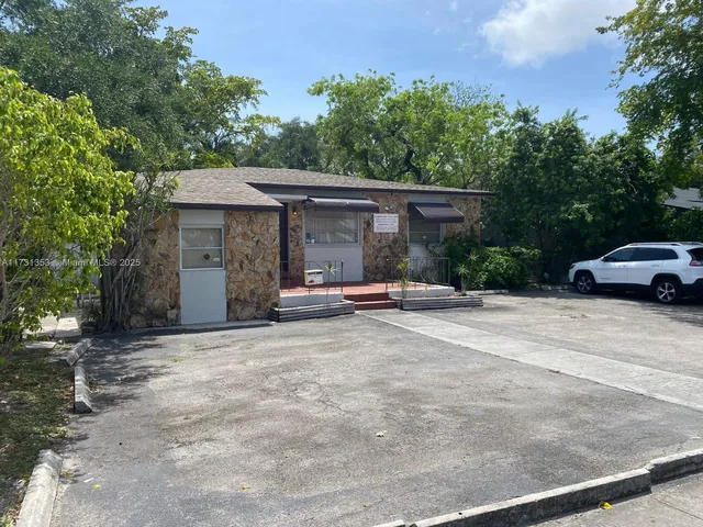a view of street with parked cars