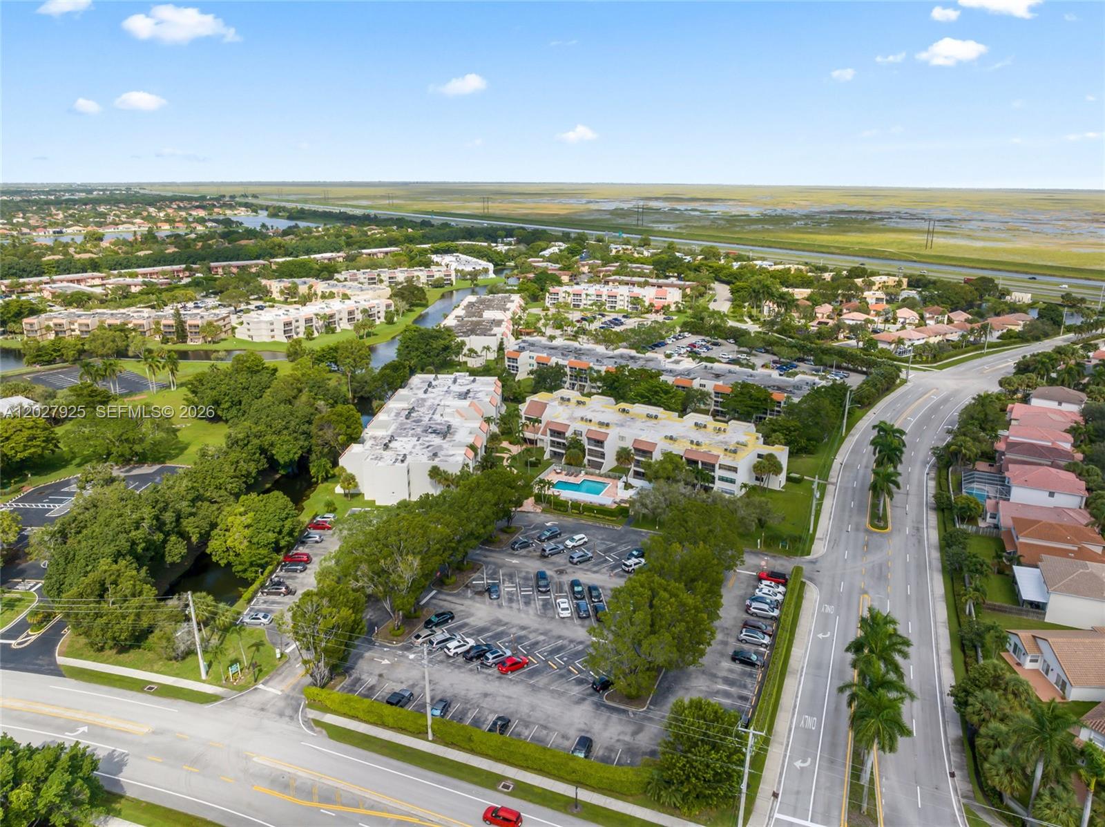 301 Racquet Club Road, Unit 103 Weston, FL 33326 - Photo 20 of 20 an aerial view of residential houses with outdoor space