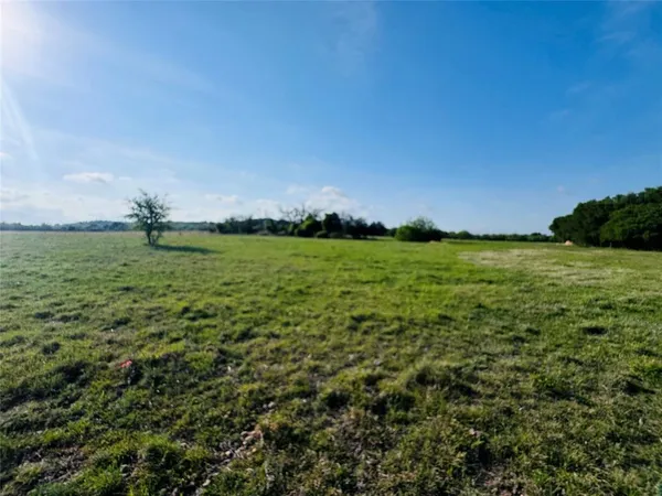a view of outdoor space with green field
