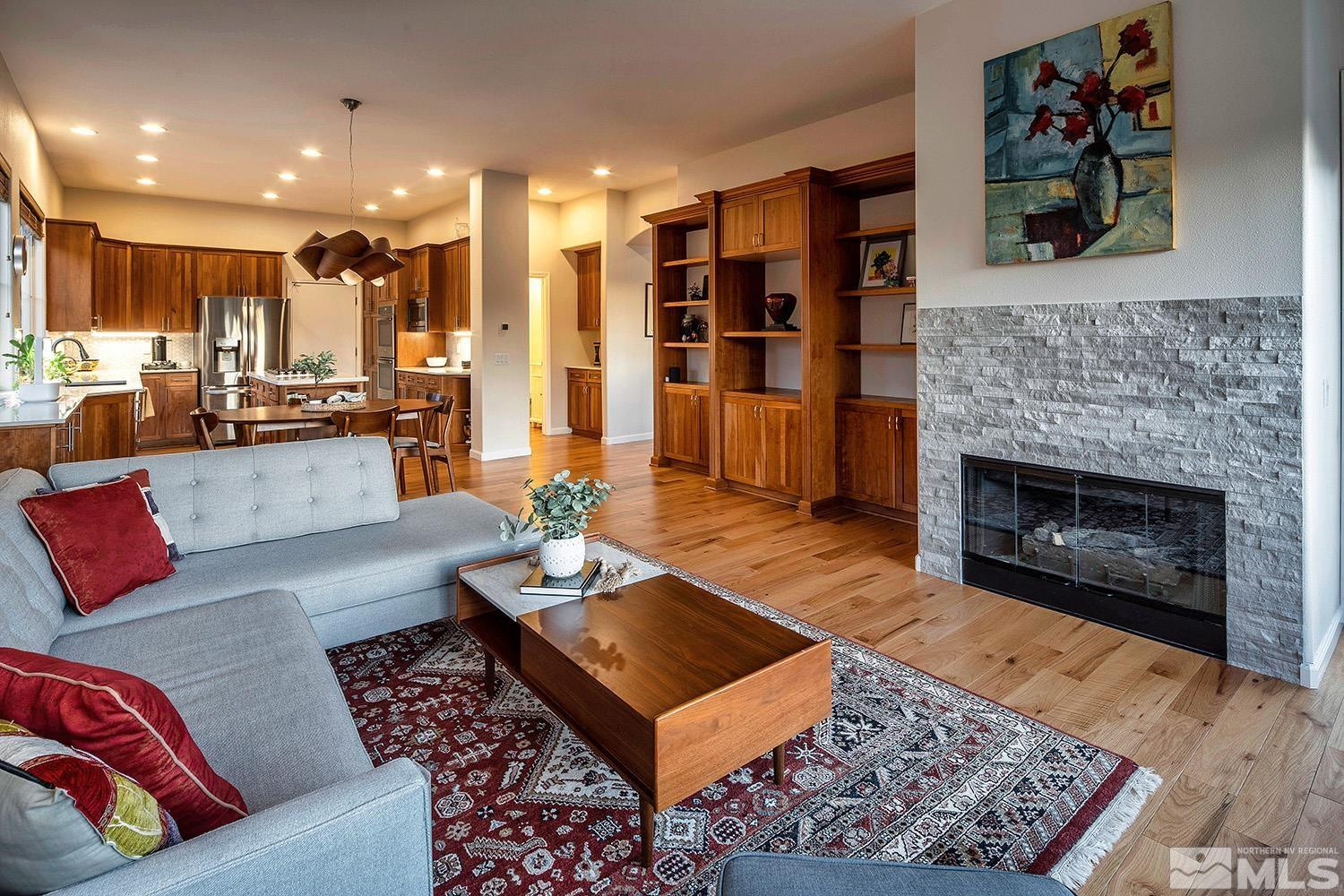 1689 Aspen Creek Road Reno, NV 89519 - Photo 6 of 40 a living room with furniture and a fireplace