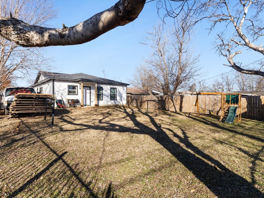 1304 East Mulkey Street Fort Worth, TX 76104 - Photo 19 of 19 a view of residential houses with snow