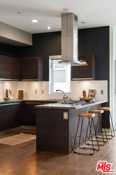 3119 Vía Dolce, Unit 302 Marina del Rey, CA 90292 - Photo 12 of 22 a kitchen with stainless steel appliances granite countertop a sink and a stove
