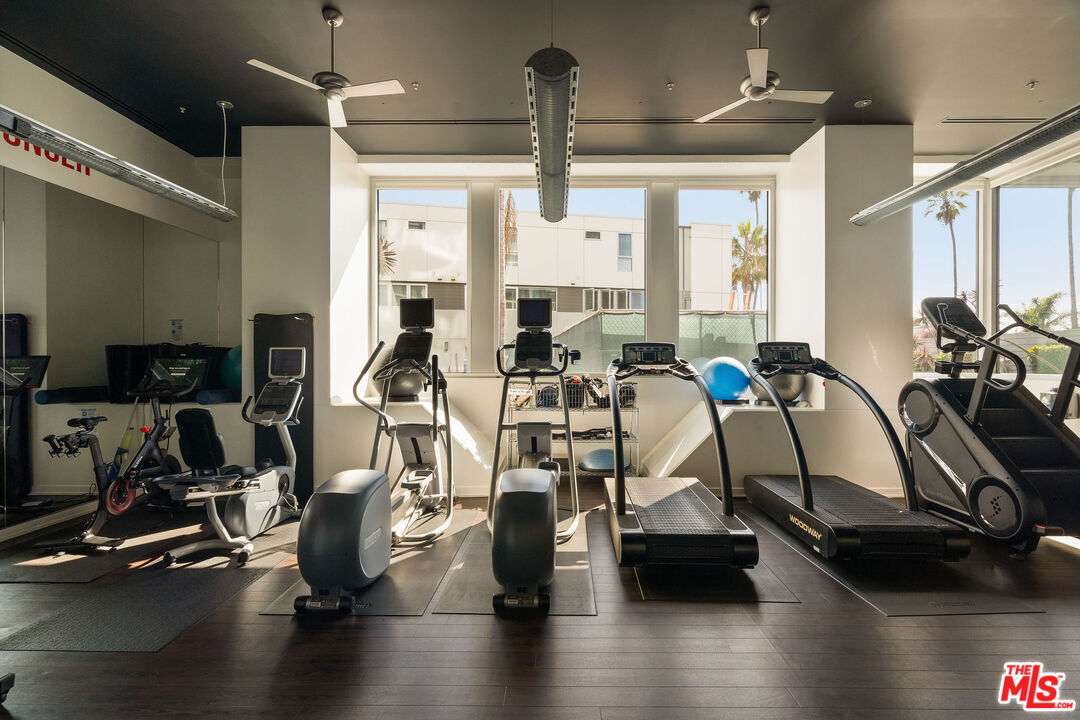 3119 Vía Dolce, Unit 302 Marina del Rey, CA 90292 - Photo 20 of 22 a view of a room with gym equipment