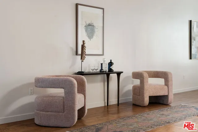 a bedroom with bed and a couch