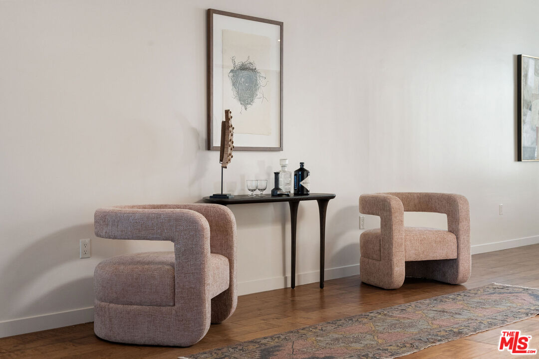 3119 Vía Dolce, Unit 302 Marina del Rey, CA 90292 - Photo 5 of 22 a bedroom with bed and a couch