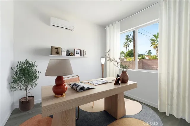 a kitchen with stainless steel appliances a sink dishwasher stove refrigerator and cabinets