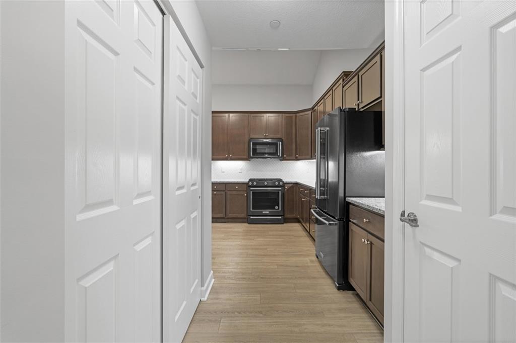 103 Spring Valley Drive Zelienople, PA 16063 - Photo 13 of 42 a view of a kitchen from the hallway