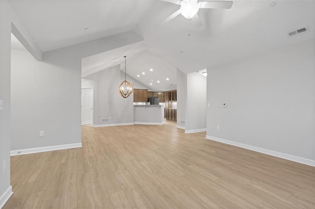 103 Spring Valley Drive Zelienople, PA 16063 - Photo 19 of 42 wooden floor in an empty room with a cabinet