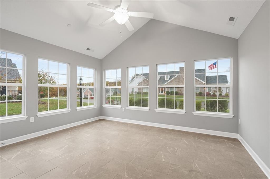 103 Spring Valley Drive Zelienople, PA 16063 - Photo 20 of 42 an empty room with windows and entrance