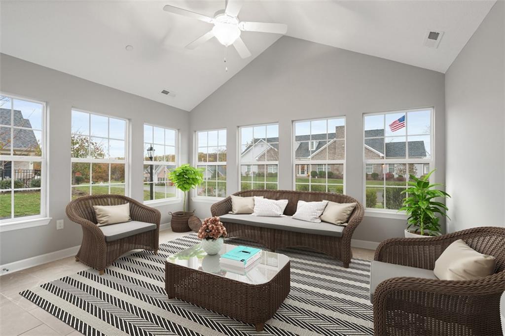 103 Spring Valley Drive Zelienople, PA 16063 - Photo 21 of 42 a living room with furniture and a large window
