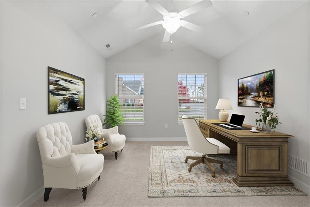 103 Spring Valley Drive Zelienople, PA 16063 - Photo 25 of 42 a living room with furniture and a flat screen tv
