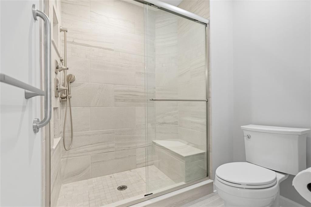 103 Spring Valley Drive Zelienople, PA 16063 - Photo 30 of 42 a bathroom with a shower and a toilet