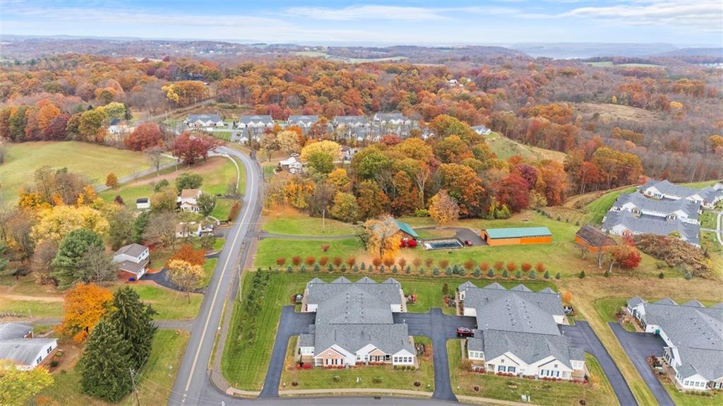 103 Spring Valley Drive Zelienople, PA 16063 - Photo 40 of 42 an aerial view of residential building and lake