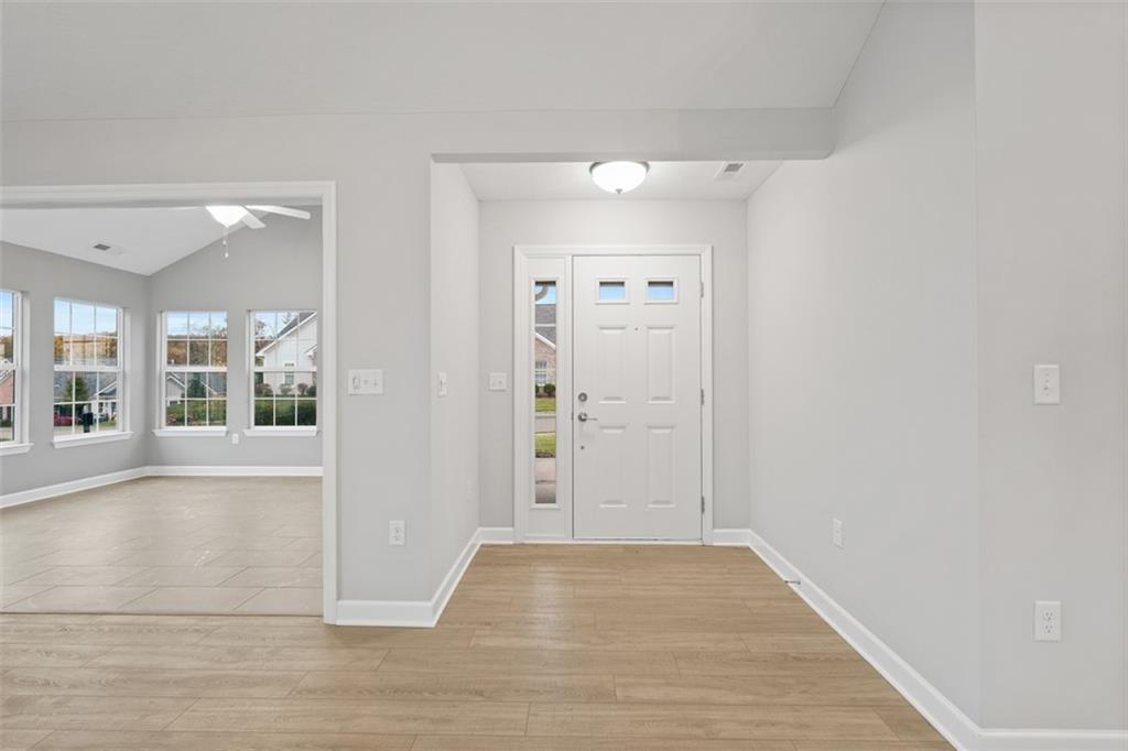 103 Spring Valley Drive Zelienople, PA 16063 - Photo 4 of 42 wooden floor in an empty room
