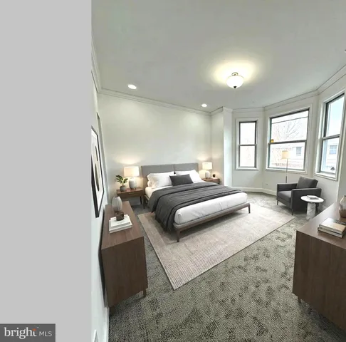 a bedroom with bed and window